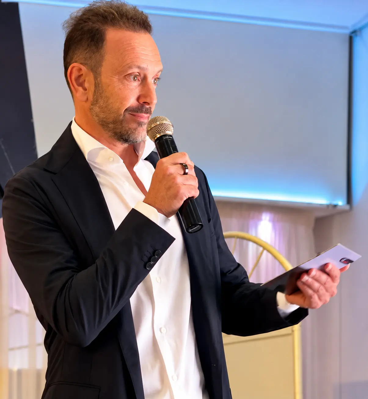 Host presenting at the Summit awards