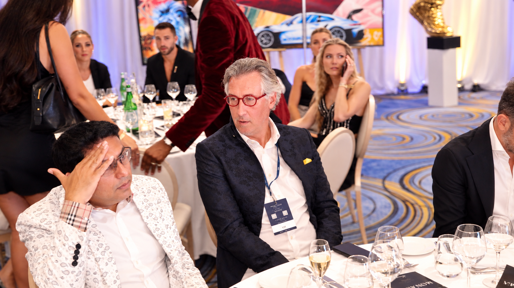 Guests seated at a Summit gala dinner table