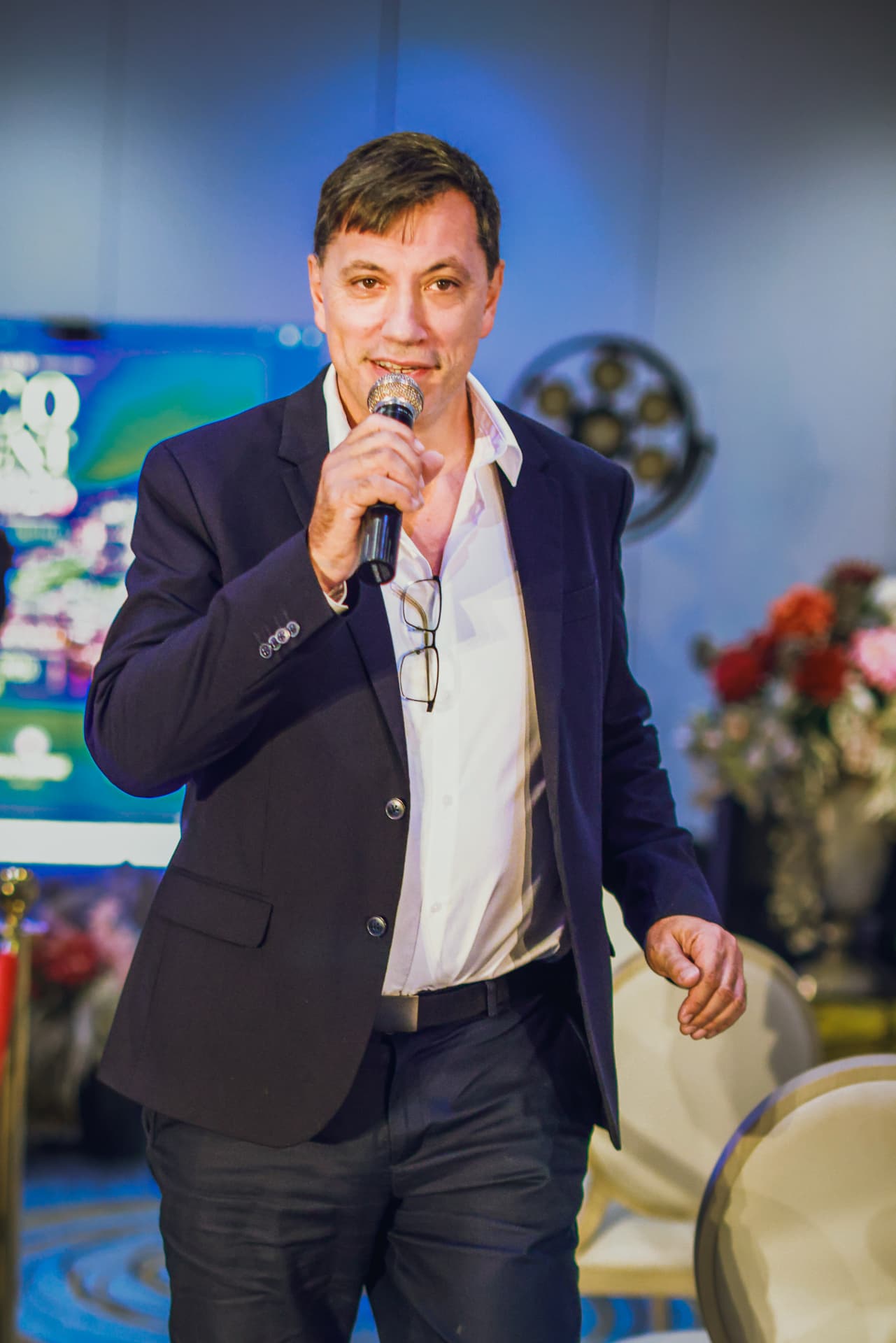 Speaker addressing the room at the Monaco Investment Summit