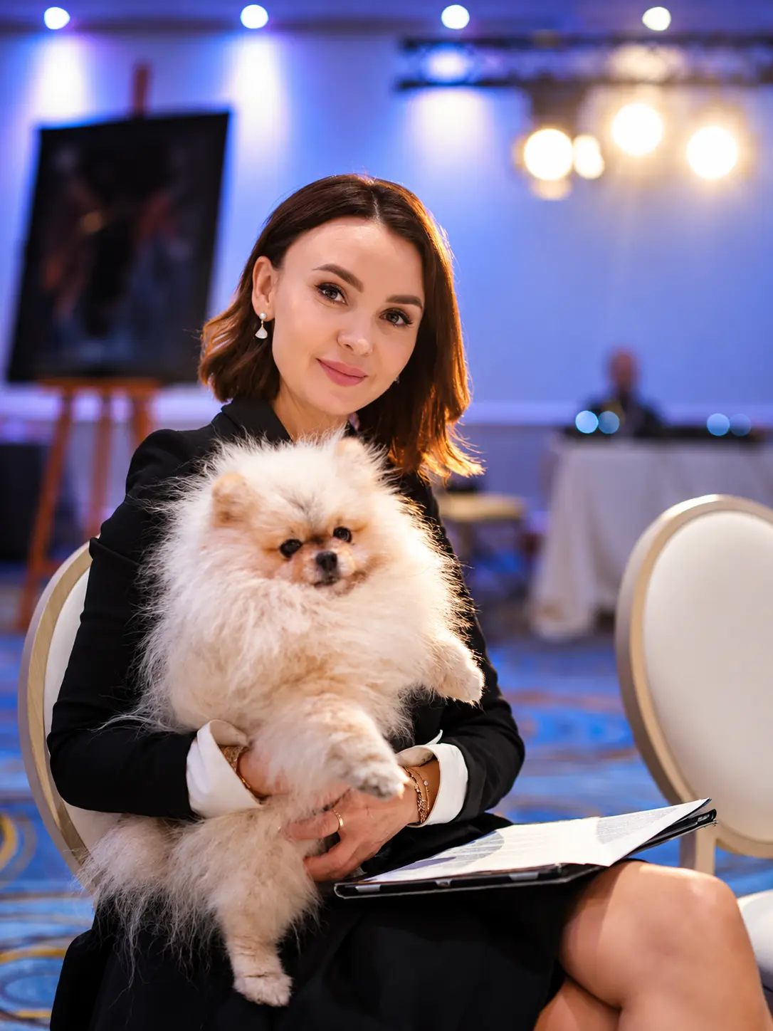 Guest with a Pomeranian at the Summit