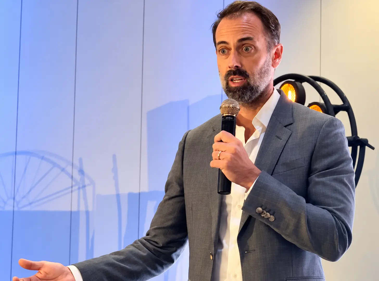 Speaker presenting on the Summit stage